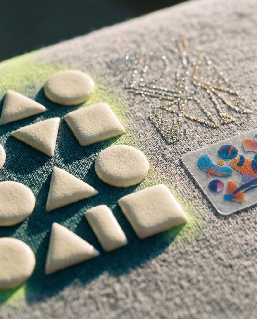 Specialty prints: 3D puff shapes, glitter and UV DTF stickers on fabric